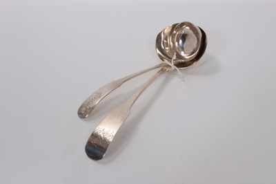 Lot 57 - George III Scottish silver sauce ladle with engraved armorial, (Edinburgh 1816), maker G F, together with a George III Irish silver ladle with engraved initials, (Dublin 1808), the larger 19cm in l...