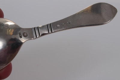 Lot 74 - Georg Jensen silver hand finished caddy spoon with tear drop handle, marked Georg Jensen 925.S, import marks for 1926, 12 cm