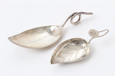 Lot 75 - George III silver leaf-shaped bowl caddy spoon with bright cut decoration and wire loop handle , marks incomplete, maker Cocks and Bettridge, 7cm