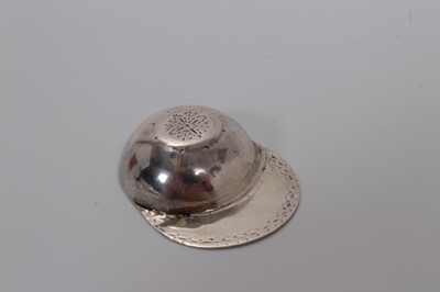 Lot 83 - George III silver jockey cap caddy spoon with bright cut decoration, London 1800, Elizabeth Morley, 5cm
