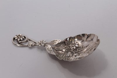 Lot 84 - Victorian silver caddy spoon with embossed floral bowl and pierced floral handle, Birmingham 1866, Hilliard & Thomason 9cm