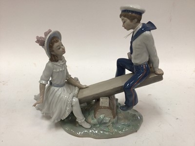 Lot 1063 - Four Lladro porcelain figures including Seesaw (boxed), girl with butterfly, girl with basket of flowers and girl in pretty dress