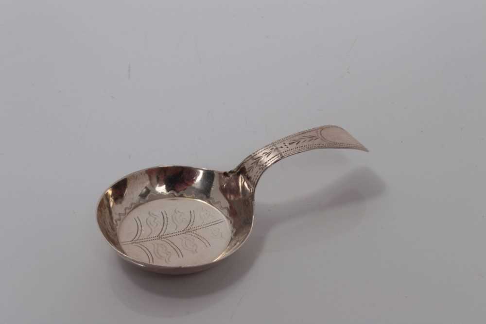 Lot 85 - George III silver frying pan-shaped caddy spoon with bright cut bowl and handle, Birmingham 1799, no makers mark 6cm