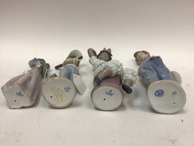Lot 1065 - Four Lladro porcelain figures including boy with baseball bat and girl with doll