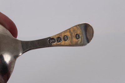Lot 90 - George III silver oval bowl caddy spoon with bright cut decoration, London 1800, Thomas Streetin 7.5 cm