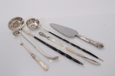 Lot 142 - Two Georgian silver toddy ladles, the bases set with coins, together with a Victorian silver pickle fork and other silver cutlery (7 piece)