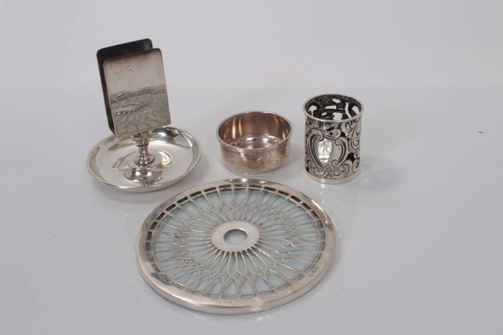 Lot 144 - George V silver overlaid glass teapot stand, (Birmingham 1922), together with a silver scent bottle cover, tea strainer stand and match box holder (various dates and makers), 5ozs of weighable silv...