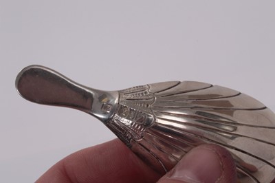 Lot 96 - George III Irish elongated shell bowl caddy spoon with short handle, Dublin 1819, James England 9cm
