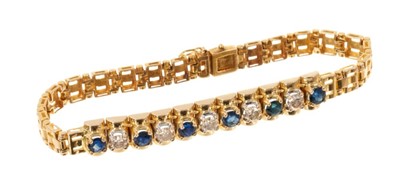 Lot 489 - Diamond and sapphire bracelet in 14ct gold setting