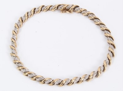 Lot 494 - 9ct gold and diamond bracelet