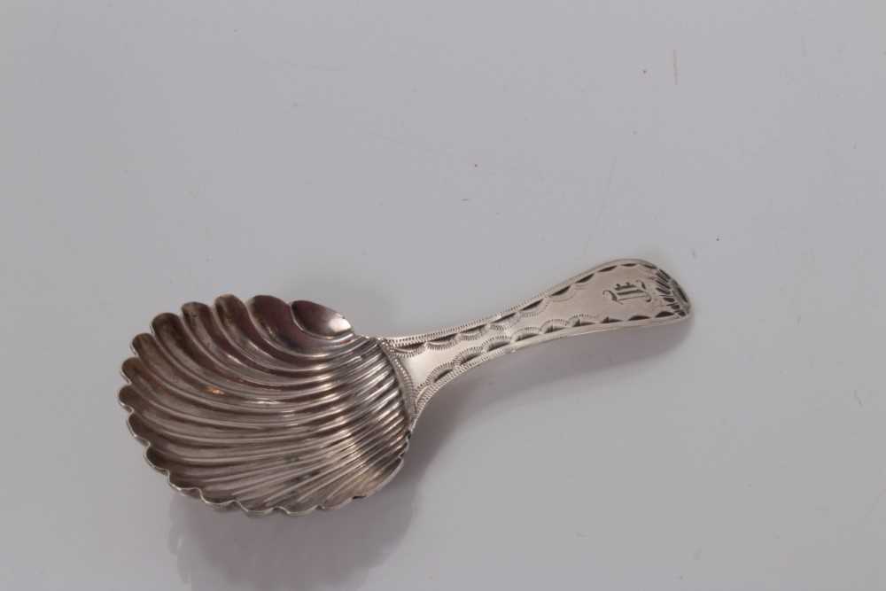 Lot 103 - George III silver shell bowl caddy spoon with bright cut decoration, London 1788, Hester Bateman 7.5cm