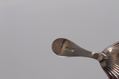 Lot 104 - Georgian silver shell bowl caddy spoon - marks rubbed, 7.5 cm