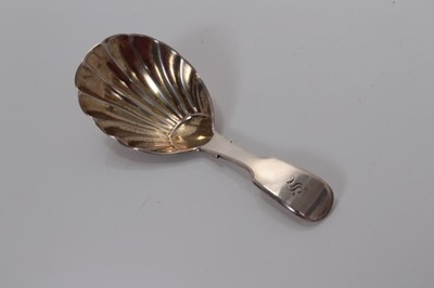 Lot 111 - Victorian silver shell bowl caddy spoon with fiddle pattern handle, London 1867, George Adams 9cm