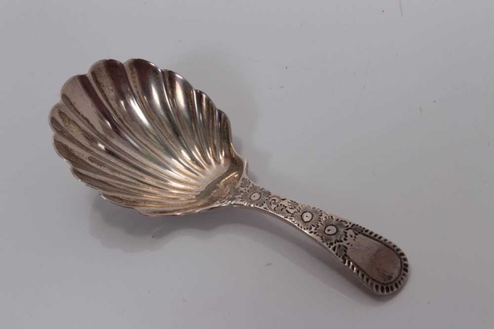 Lot 112 - Victorian silver shell bowl caddy spoon with floral engraved handle, London 1894, George Mandsley Jackson 8.5 cm