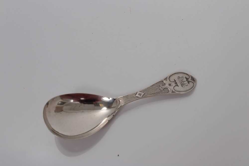 Lot 116 - Victorian silver caddy spoon with Gothic engraved decoration, Birmingham 1863, George Unite 9.6 cm