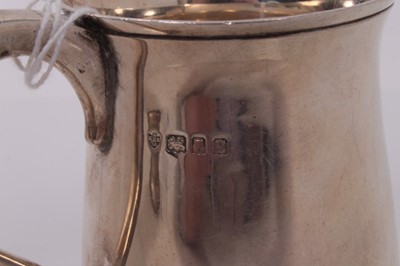 Lot 160 - George V silver christening mug, with engraved initials 'A. J. R.', (London 1922), 5ozs, 9cm in overall height.