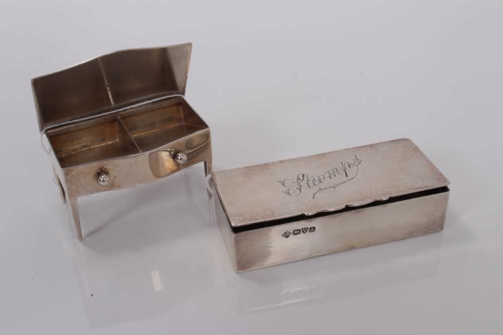 Lot 130 - Edwardian silver triple stamp box, Chester 1901, 8 cm and novelty silver stamp box table, Birmingham 1911, 6 cm (2)