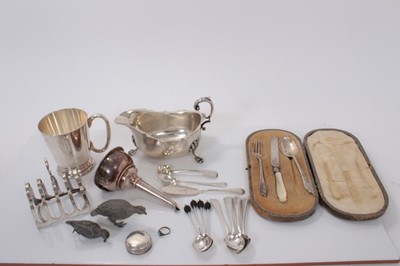Lot 173 - Collection of silver flatware (various dates and makers), together with a silver plated wine funnel, sauce boat and other silver plated items, 5ozs of weighable silver.
