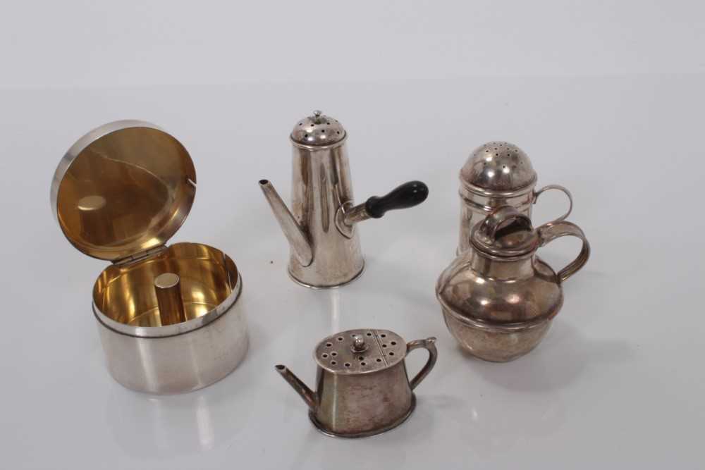 Lot 177 - Sterling silver ribbon spooler and four minature silver novelty condiments (5)