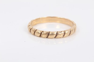 Lot 657 - Large 19th century gold ring