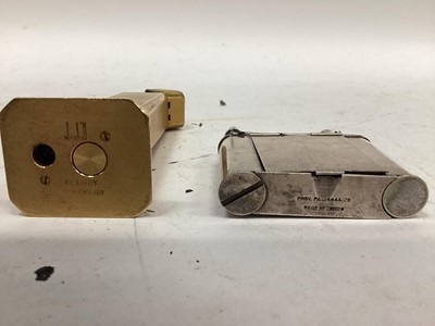 Lot 2410 - Dunhill tall boy lighter and Dunhill lighter/powder compact