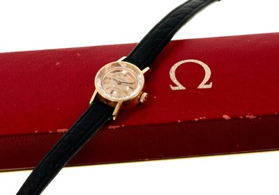 Lot 610 - 1960s ladies' Omega gold wristwatch on leather strap in original box