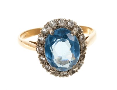 Lot 427 - Blue topaz and white stone cluster ring