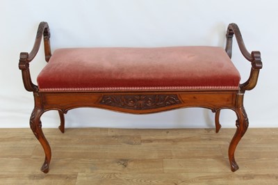 Lot 28 - Early 20th century carved walnut framed duet piano stool with padded seat on cabriole legs, 96cm wide, 44cm deep, 64.5cm high
