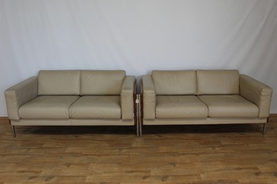 Lot 32 - Pair of good quality Habitat Robin Day Forum two seater leather sofas with hardwood and chrome frames, 147cm wide, 80cm deep, 68cm high