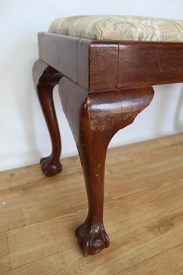 Lot 34 - Mahogany framed stool with drop in seat on cabriole legs with claw and ball feet, 79cm wide, 40cm deep, 50cm high, together with an oak refectory style coffee table (2)
