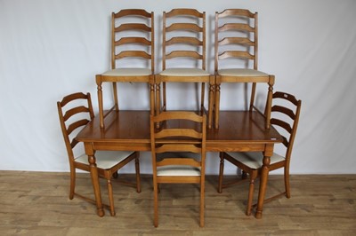 Lot 37 - Oak dining room suite comprising table, six ladderback chairs, two height display unit