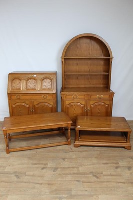 Lot 38 - Oak two height dome top dresser, oak bureau, coffee table and television stand (4)