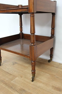 Lot 39 - Victorian mahogany two tier table/whatnot on turned legs with brass capped castors, 52cm wide, 44.5cm deep, 69cm high