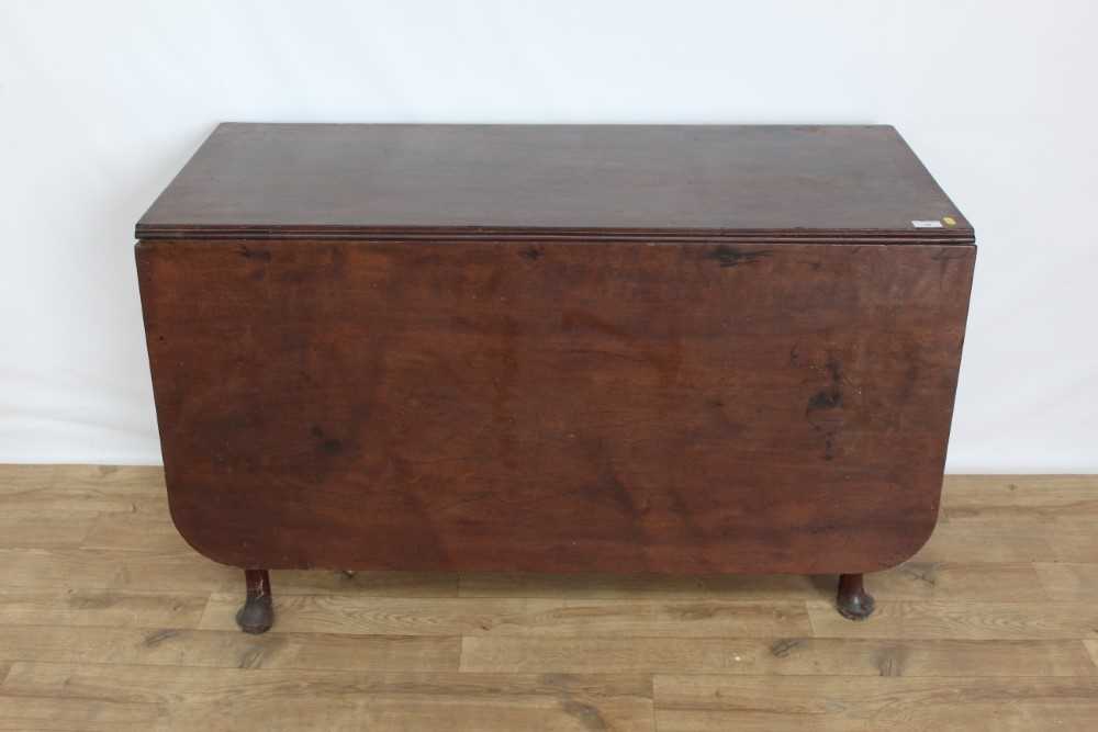 Lot 44 - Nineteenth century mahogany drop leaf dining table on turned legs, opening to 154.5cm x 114cm