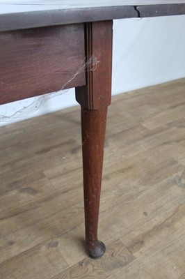 Lot 44 - Nineteenth century mahogany drop leaf dining table on turned legs, opening to 154.5cm x 114cm