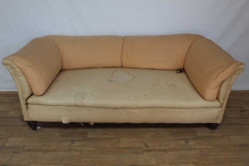 Lot 1272 - Victorian settee with salmon upholstery by Howard & Sons