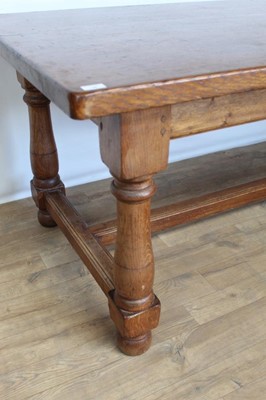 Lot 58 - Good quality oak refectory table on turned and block legs joined by stretchers, 230cm x 92cm x 77cm high
