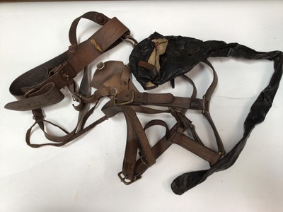 Lot 749 - Two boxes of First World War canvas webbing items, Sam Browne belt and other leather items.