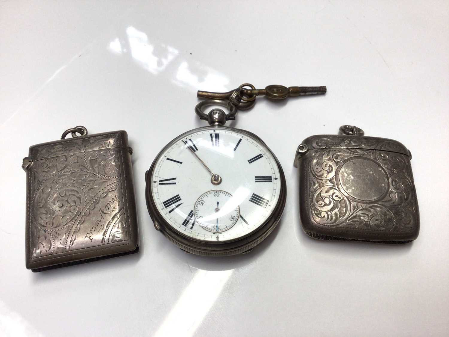 Lot 81 - Victorian silver cased pocket watch (London 1882) and two silver vesta cases
