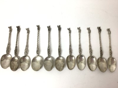 Lot 113 - Eleven Continental silver coffee spoons with figure decoration