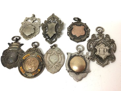 Lot 119 - Collection of eight silver fobs