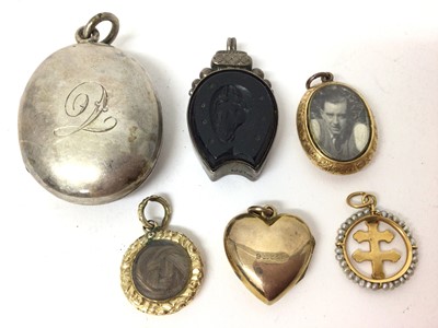 Lot 121 - Six Victorian and later pendants and lockets