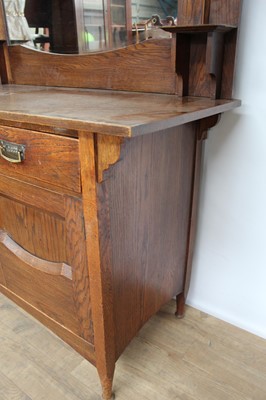 Lot 59 - Edwardian oak two height sideboard with raised mirror back, two drawers and two panelled doors below, 159cm wide, 58cm deep, 165.5cm high