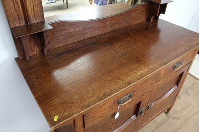 Lot 59 - Edwardian oak two height sideboard with raised mirror back, two drawers and two panelled doors below, 159cm wide, 58cm deep, 165.5cm high