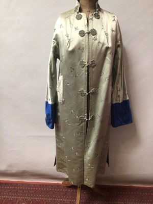 Lot 2096 - Vintage Chinese blue silk brocade jacket by Dolls House size small, two Chinese silk hostess dresses with manderine collars and a reversable silk brocade coat with fabric fastenings. Plus an Ottoma...