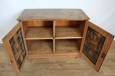 Lot 66 - Pine cupboard with shelved interior enclosed by two panelled doors, 106cm wide, 48cm deep, 78cm high