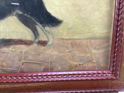 Lot 30 - Henry Percy, oil on board - A dog with a bone in a stable, signed, 17cm x 22cm, framed