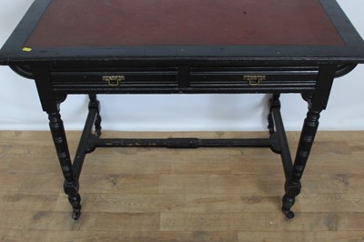 Lot 72 - Late Victorian ebonised writing table inset lined top, two drawers below on turned legs joined by stretchers, 106cm wide, 57cm deep, 76cm high