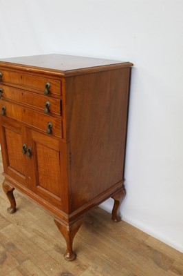 Lot 73 - 1930's Mappin & Webb walnut cutlery cabinet with three drawers and two panelled doors below on cabriole legs, 60cm wide, 45cm deep, 96cm high