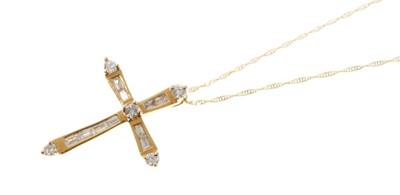 Lot 468 - Diamond cross pendant with baguette and brilliant cut diamonds in 18ct gold setting on chain